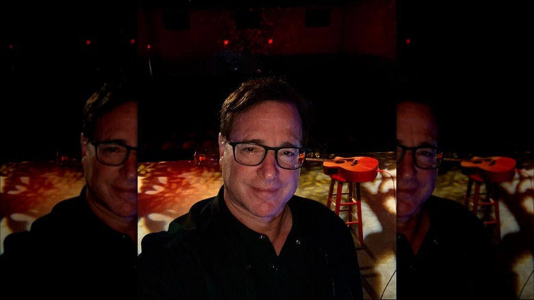 Bob Saget selfie with a guitar on a stool