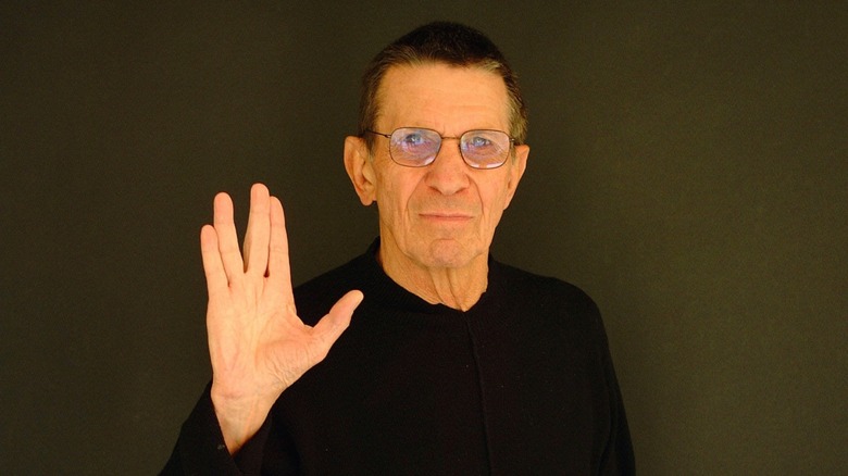 Leonard Nimoy holding up Star Trek hands