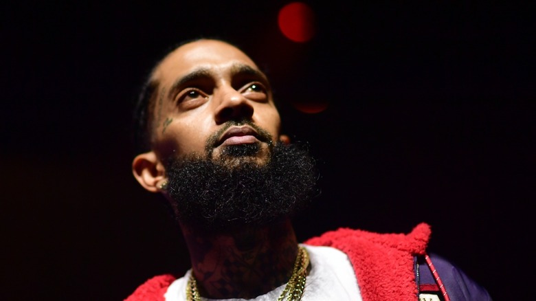 Nipsey Hussle looking up