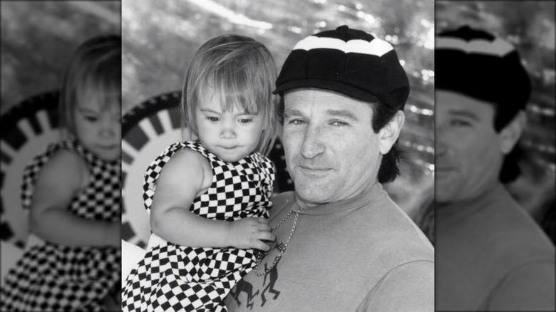 Robin Williams hugging Zelda black and white