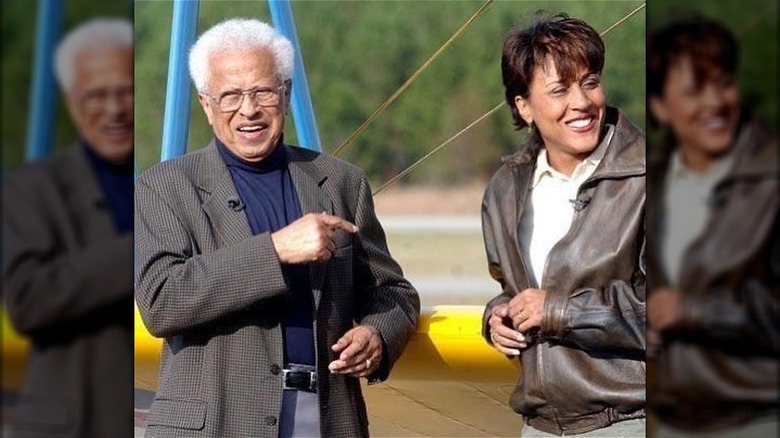 Col. Lawrence Roberts and daughter Robin smiling