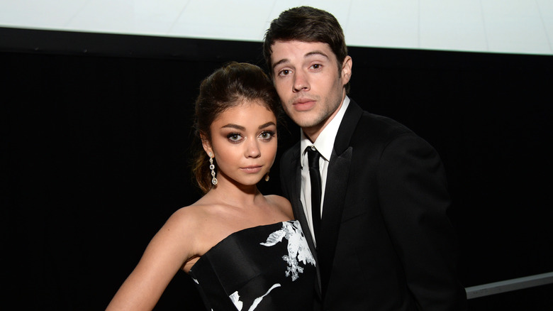 Sarah Hyland and Matt Prokop posing together in formal dress