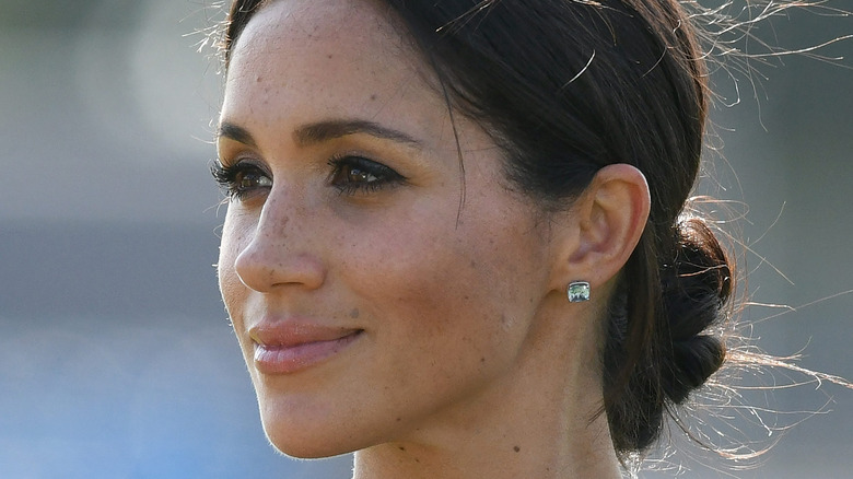 Meghan Markle looking solemn