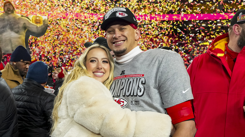 Brittany Mahomes hugging Patrick Mahomes after the AFC Championship game