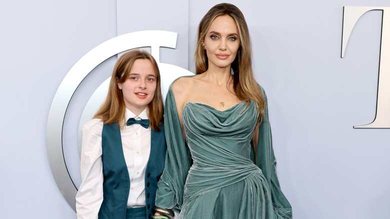 Vivienne Jolie-Pitt and Angelina Jolie looking forward