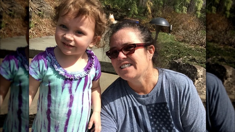 Rosie O'Donnell smiling with her daughter Dakota as a toddler