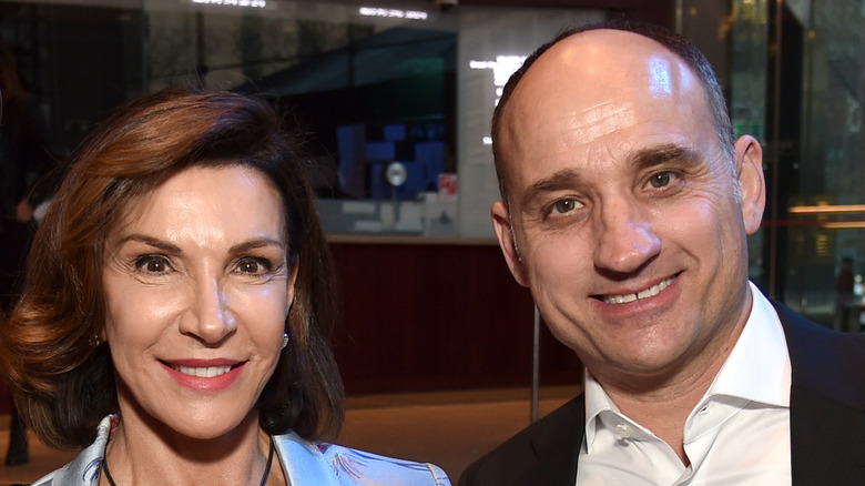 Hilary Farr and David Visentin posing at an event