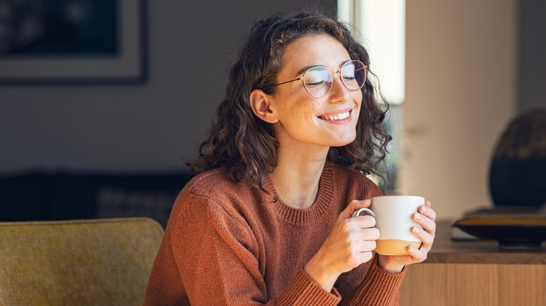 Smiling woman on couch