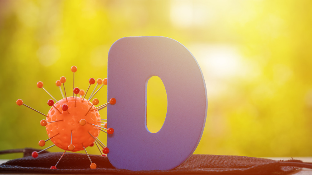 The letter D and an animated nutrient in the sunlight 