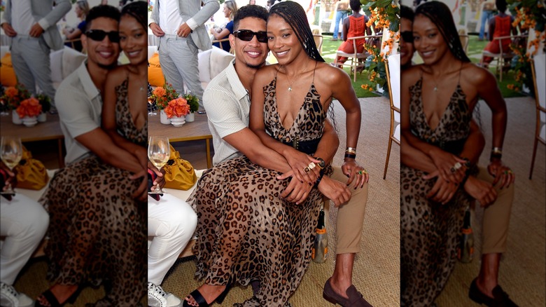 Keke Palmer sitting on Darius Jackson's lap