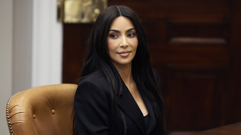 Kim Kardashian in a dark suit