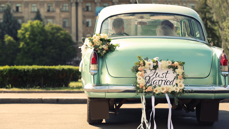 Vintage car with just married sign