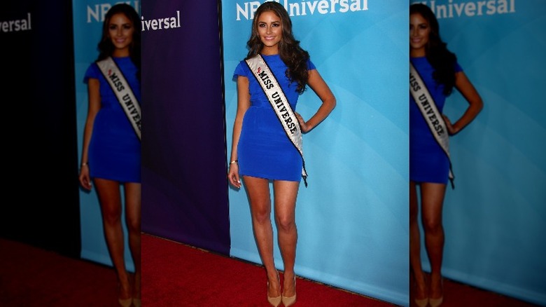 Olivia Culpo wearing Miss Universe sash