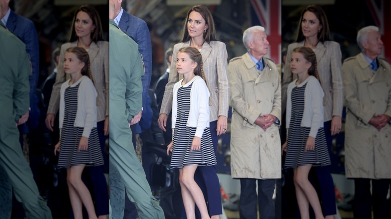 Kate Middleton and Princess Charlotte walking