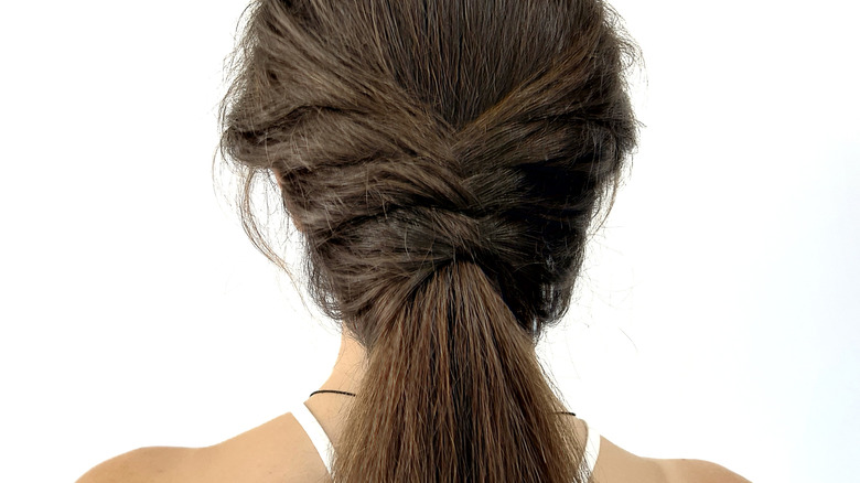 woman with fishtail ponytail braid