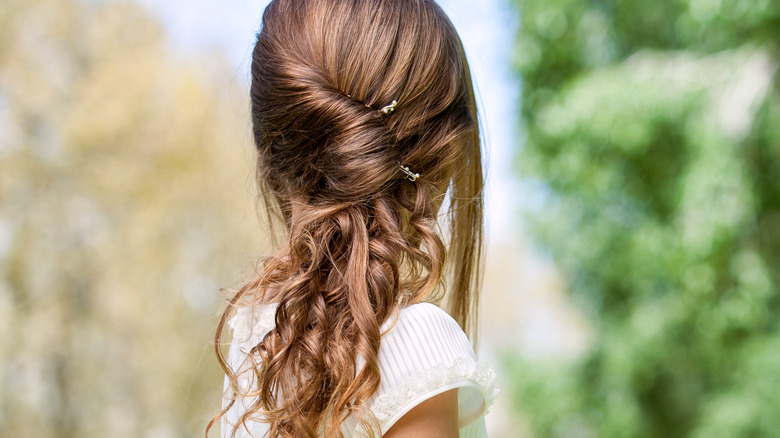 girl with french twist ponytail