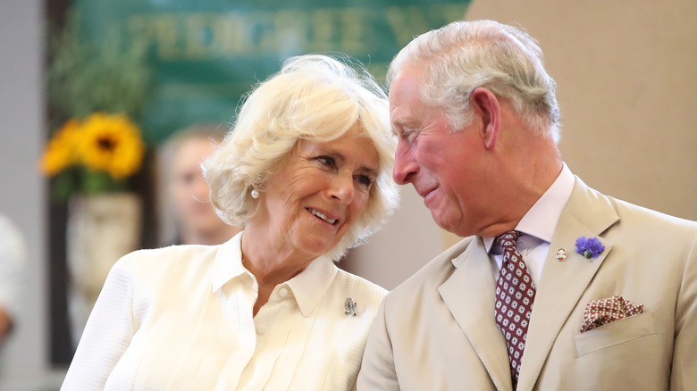 Camilla Parker Bowles and King Charles III smiling 