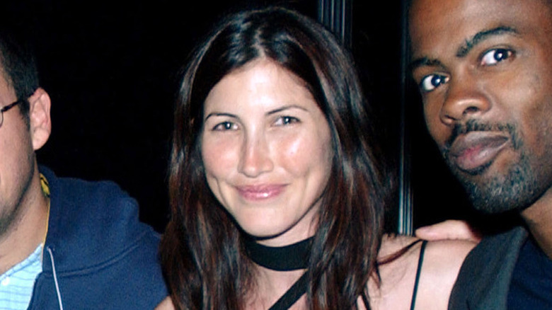 Jackie Sandler posing with Chris Rock