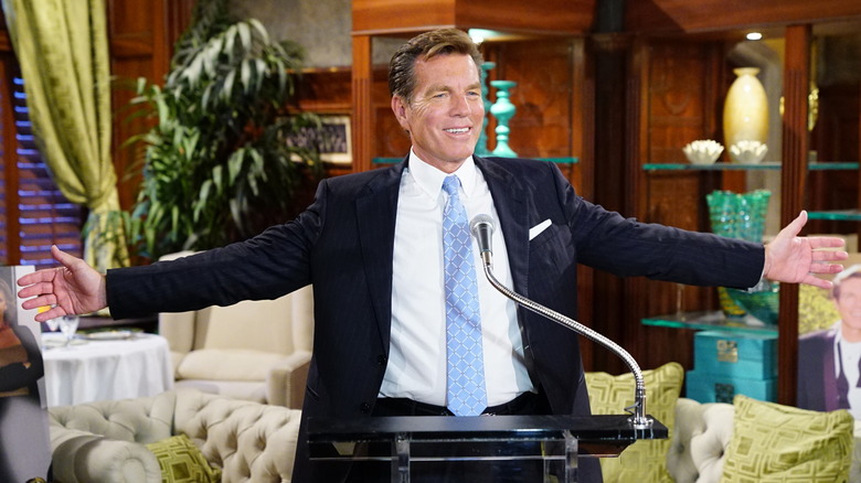 Peter Bergman smiling with his arms outstretched