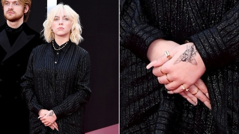 Billie Eilish posing with closeup of her new tattoo