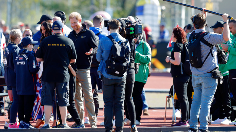 Film crew follows Prince Harry