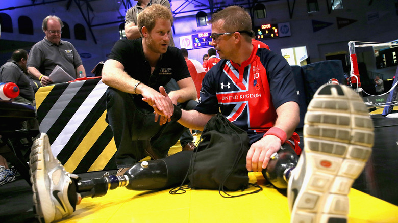 Prince Harry speaks with athlete at Invictus Games 