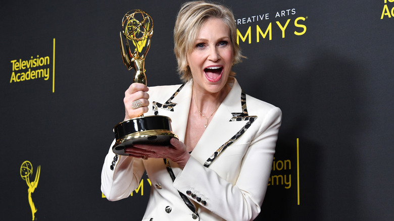 Jane Lynch with an Emmy