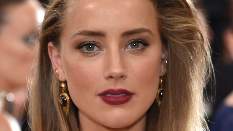 Amber Heard posing at an event