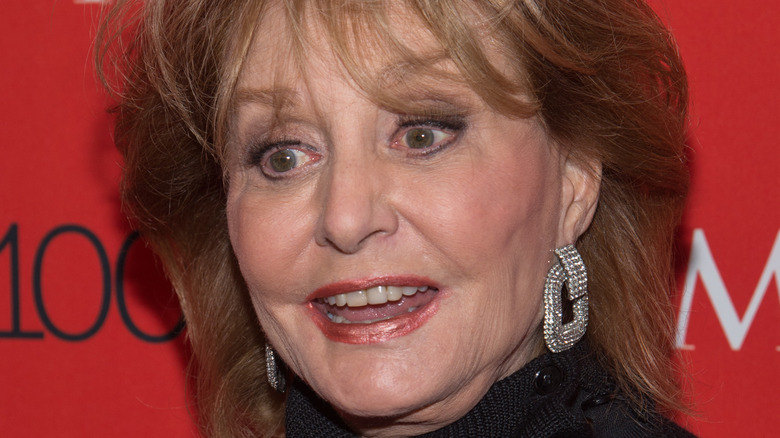 Barbara Walters raising her eyebrows