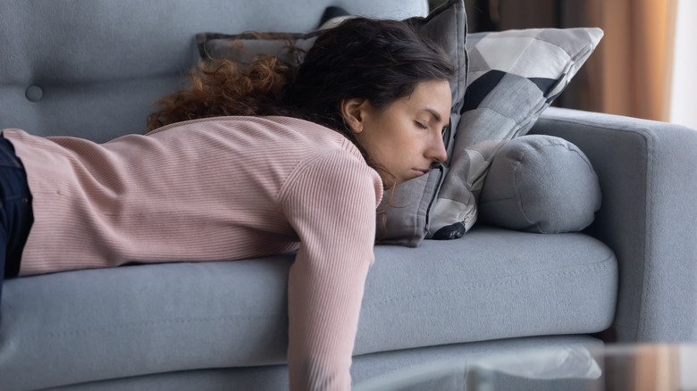 Woman sleeping on the couch