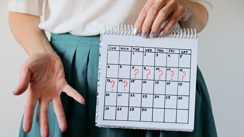 Woman holding a calendar