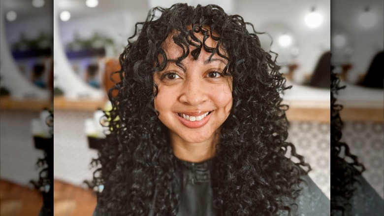 Curly haircut with Korean air bangs