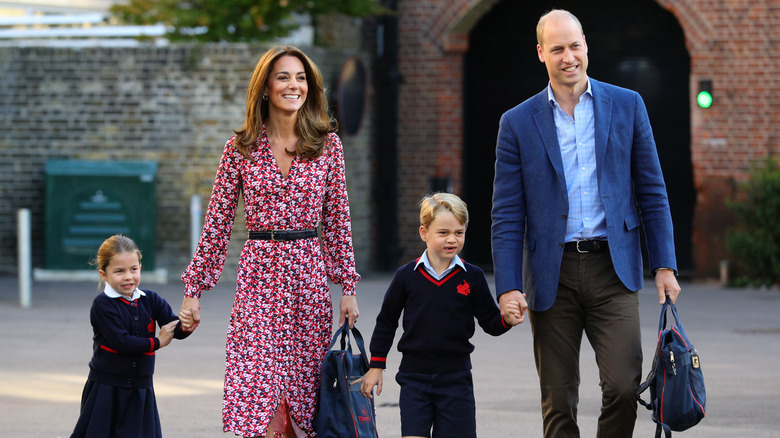 Princess Charlotte, Kate Middleton, Prince George, Prince William holding hands and walking together