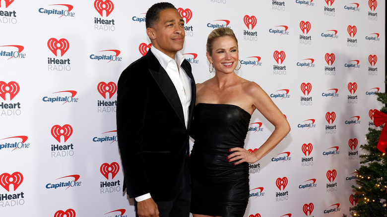 Amy Robach smiling with T.J. Holmes 