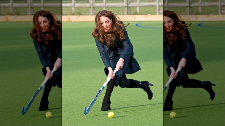 Princess Catherine plays field hockey on a visit to St. Andrew's school