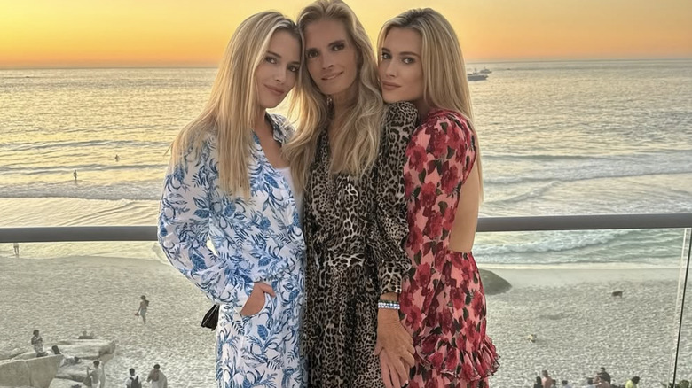 Victoria Aitken at the beach with Eliza and Amelia Spencer