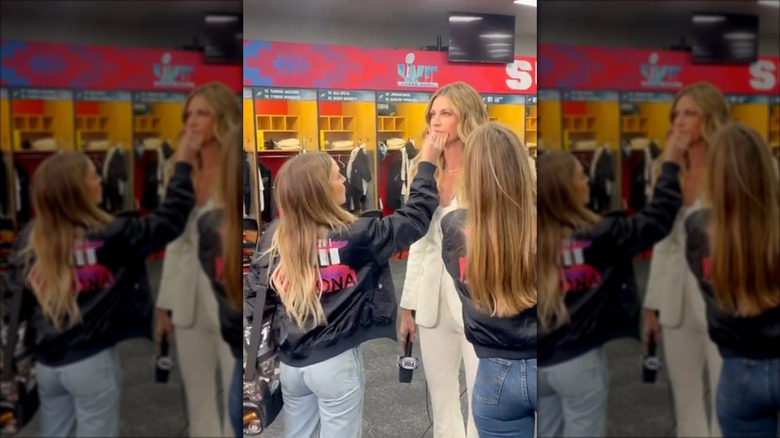 Erin Andrews getting glam in locker room