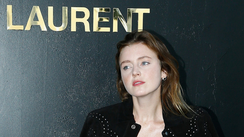 Lorraine Nicholson poses at Paris Fashion Week outside of the YSL show.