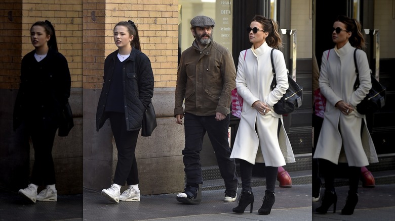 Lily Mo Sheen, Michael Sheen, and Kate Beckinsale walking