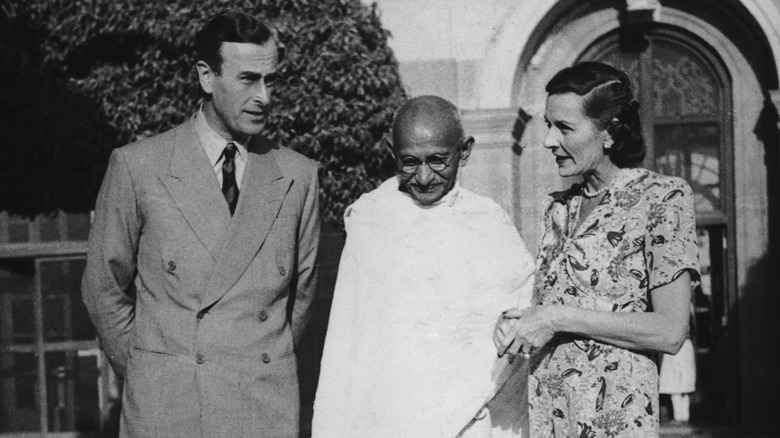 The Mountbattens walking with Gandhi