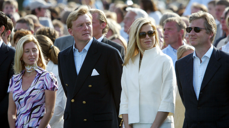 The Greek and Dutch royal families standing together