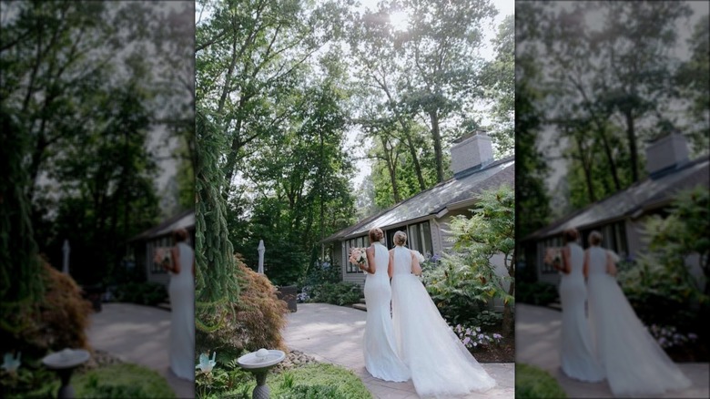 Roberts and Laign in their yard on their wedding day