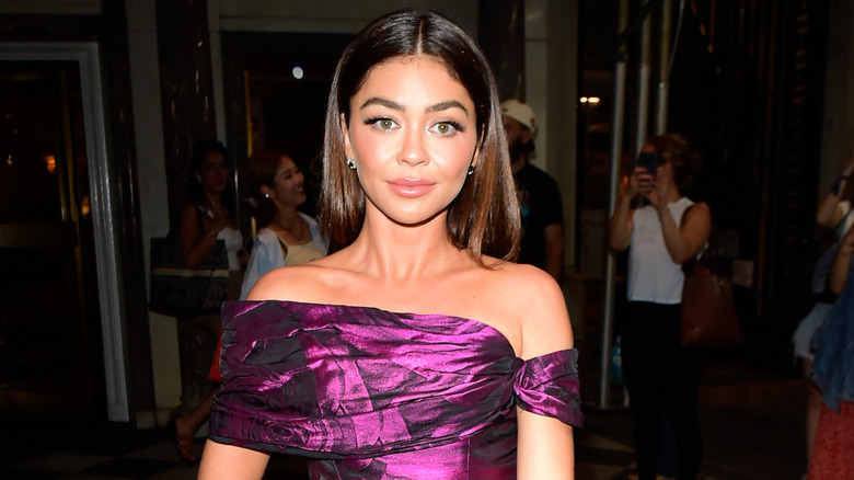 Sarah Hyland posing at event