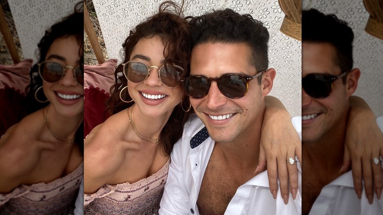 Selfie of Sarah Hyland and Wells Adams smiling in an embrace