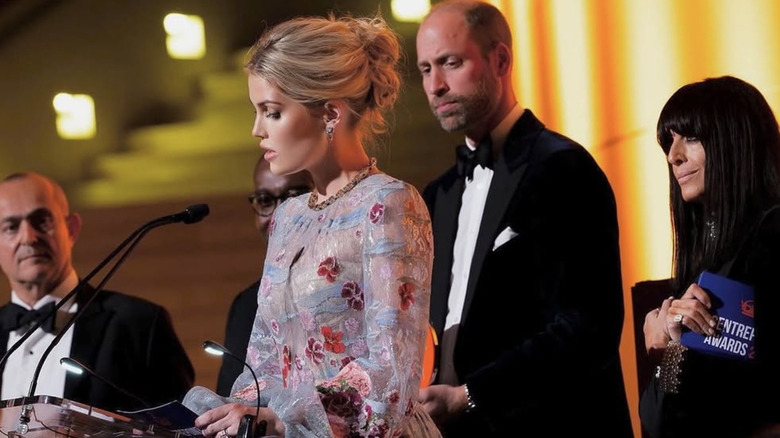 Lady Kitty Spencer speaking at podium with Prince William looking on