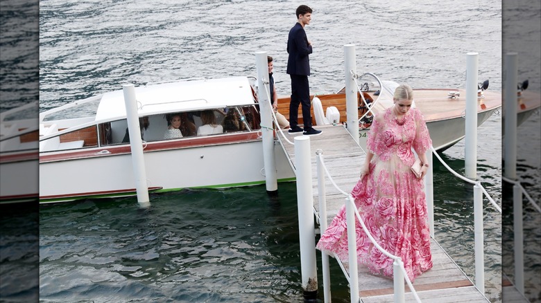 Lady Kitty Spencer walking away from a docked boat