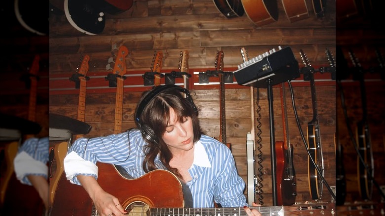 Scout Willis playing guitar