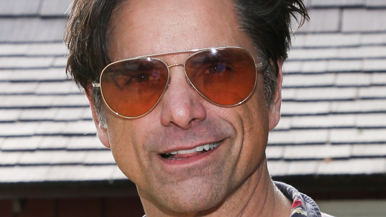 John Stamos pointing