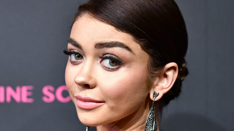 Sarah Hyland looks over her shoulder