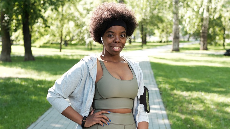 Woman in activewear smiling